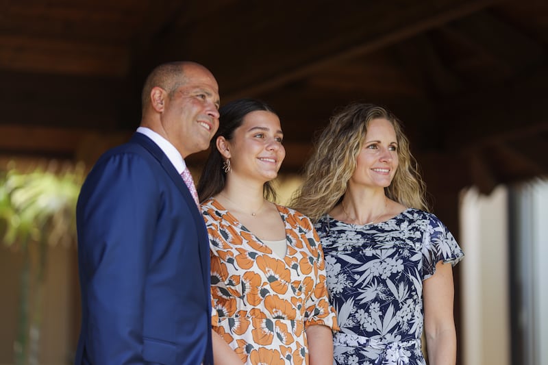 BYU–Hawaii President John S.K. Kauwe III and his wife, Sister Monica Kauwe, pose for a photo with their daughter, who performed a musical number on the piano during the campus devotional held on Tuesday, May 6, 2025, in Laie, Hawaii.