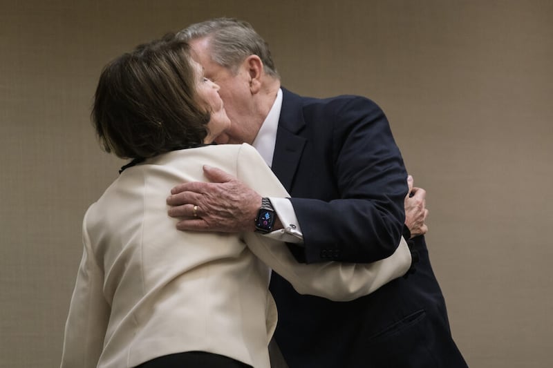 Sister Patricia Terry Holland, left, and Elder Jeffrey R. Holland of the Quorum of the Twelve Apostles of The Church of Jesus Christ of Latter-day Saints, embrace and kiss after Elder Holland’s introduction of Sister Holland at the 2021 BYU Management Society Scholarship Banquet Friday, Nov. 5, 2021, in St. George, Utah.