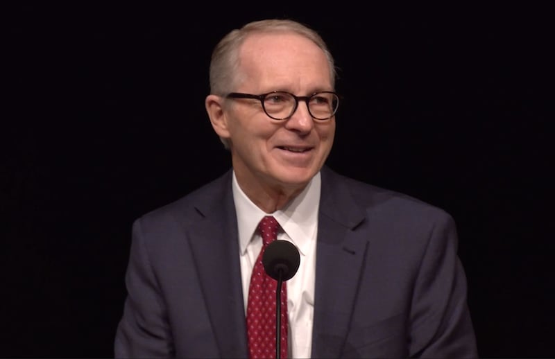 President Bruce C. Kusch speaking at a pulpit in the Conference Center Theater.