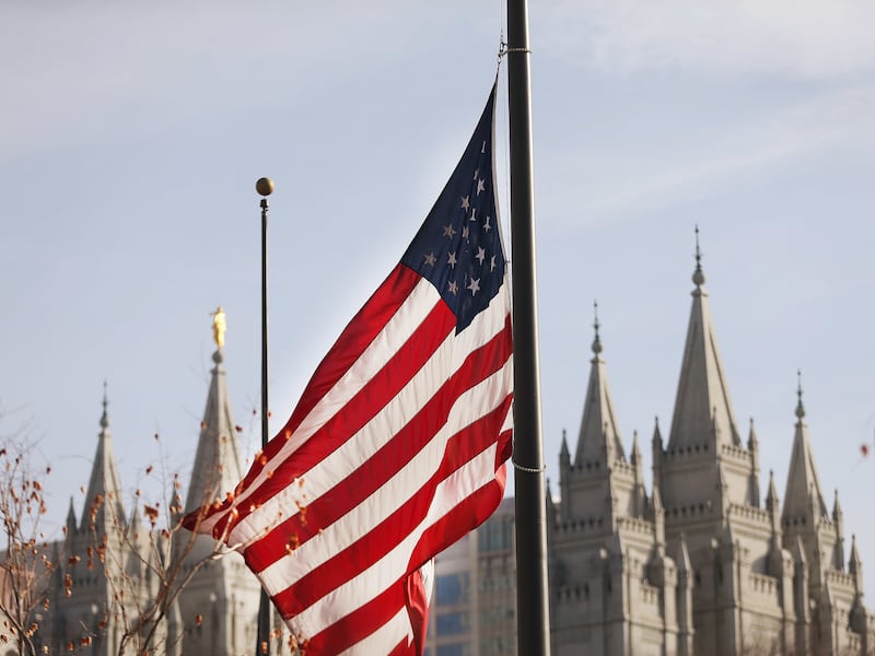 A flag flies at half-staff near the Salt Lake Temple to honor President Thomas S. Monson after his death in Salt Lake City, on Wednesday, Jan. 3, 2018.